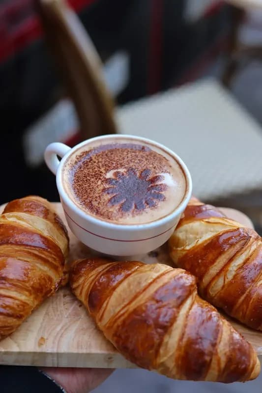 A cream-topped French Coffee served at the Chez Max cafe corner