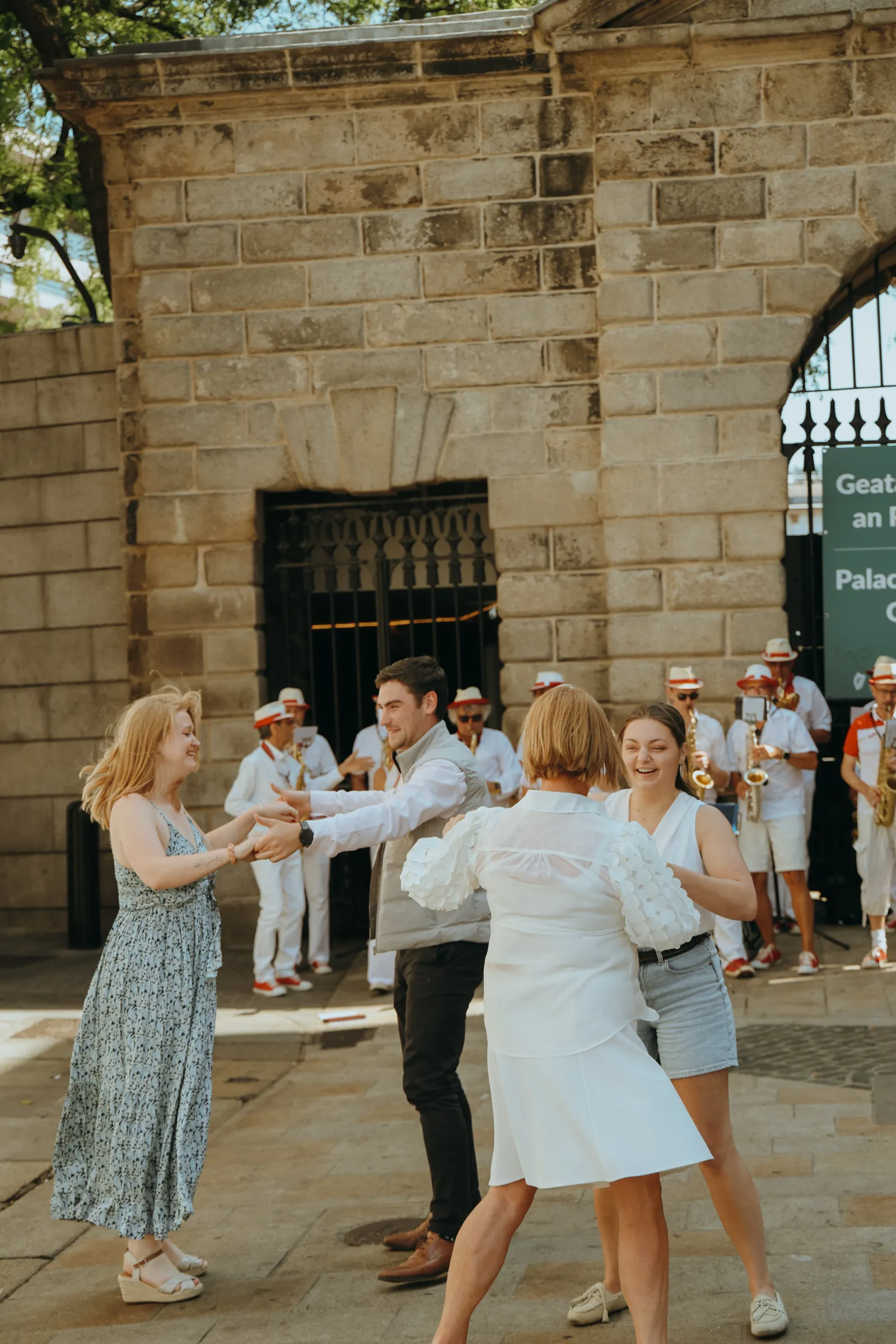 Guests dancing as the brass band plays outside Chez Max