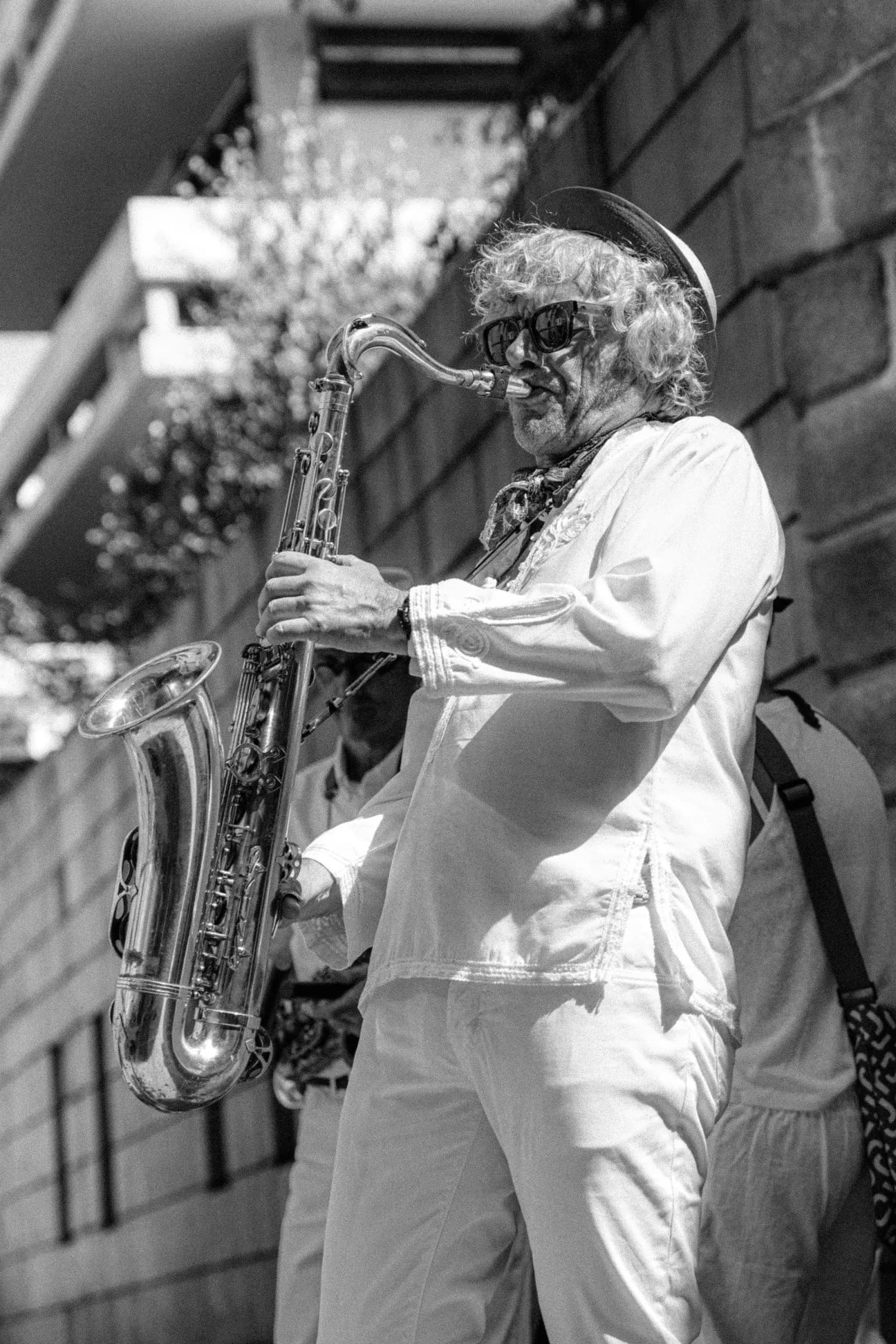 A saxophonist playing during the Bastille Day celebrations