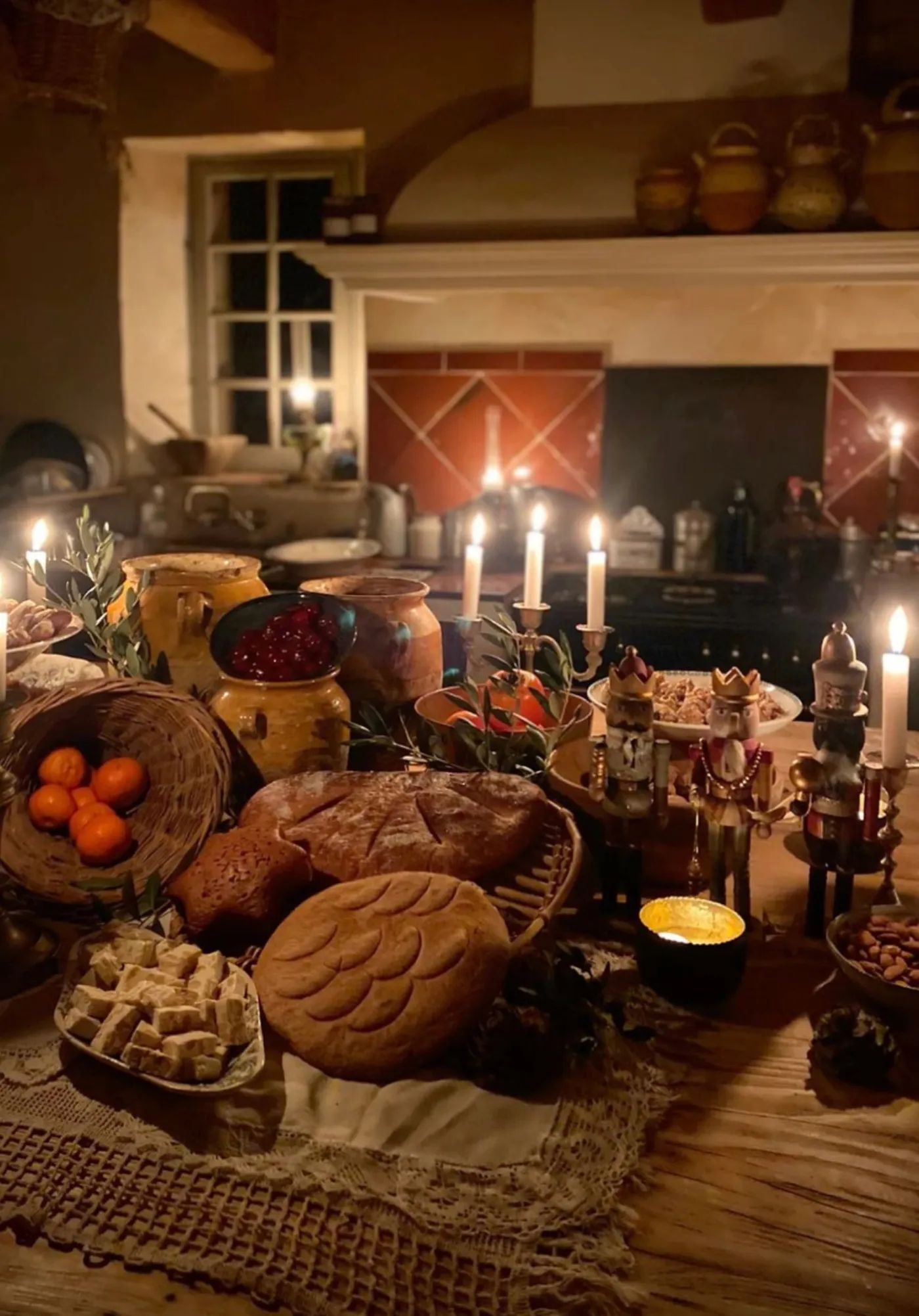 A candlelit table of Provençal Christmas desserts